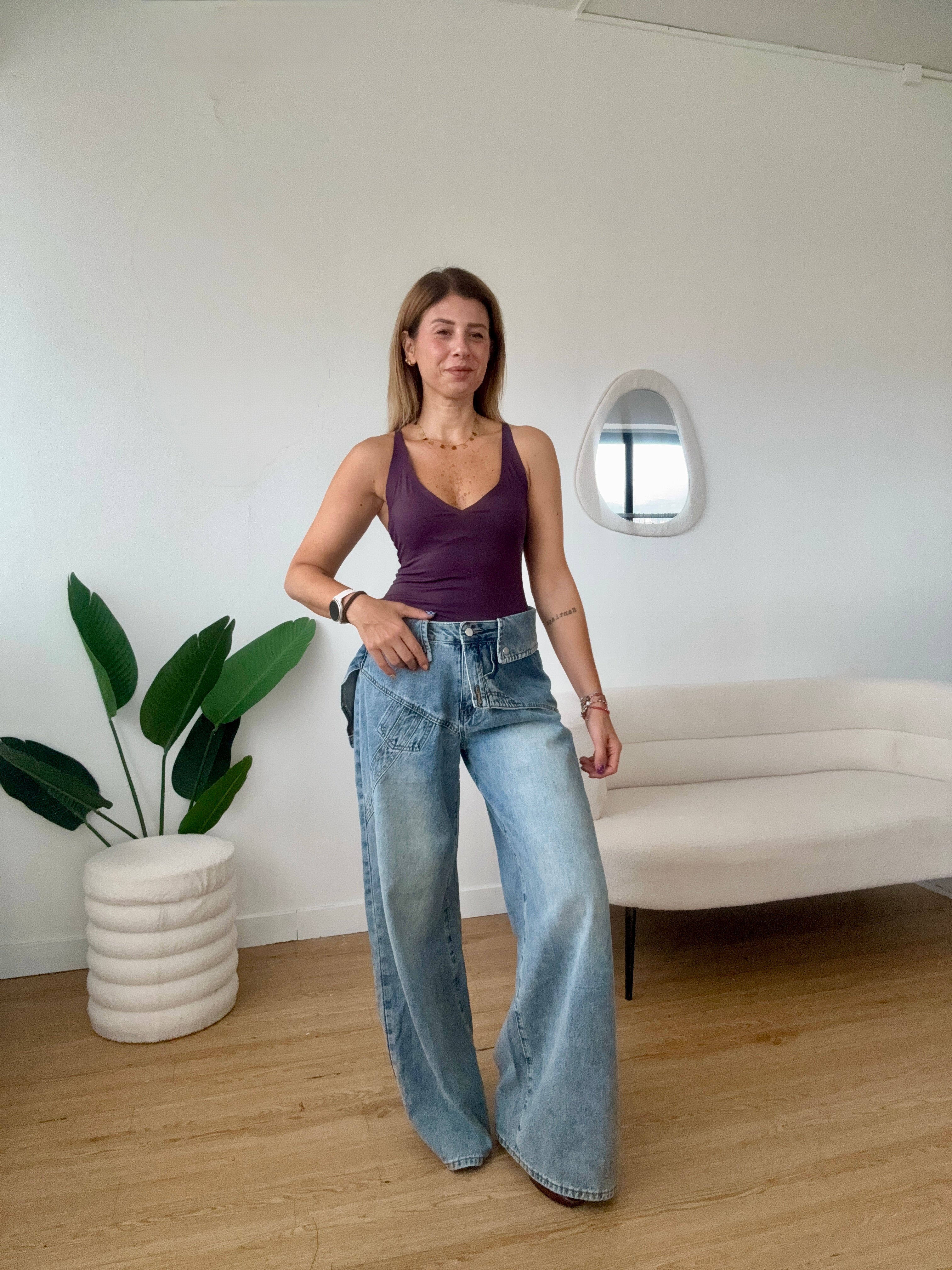 Jeans cintura effetto salopette