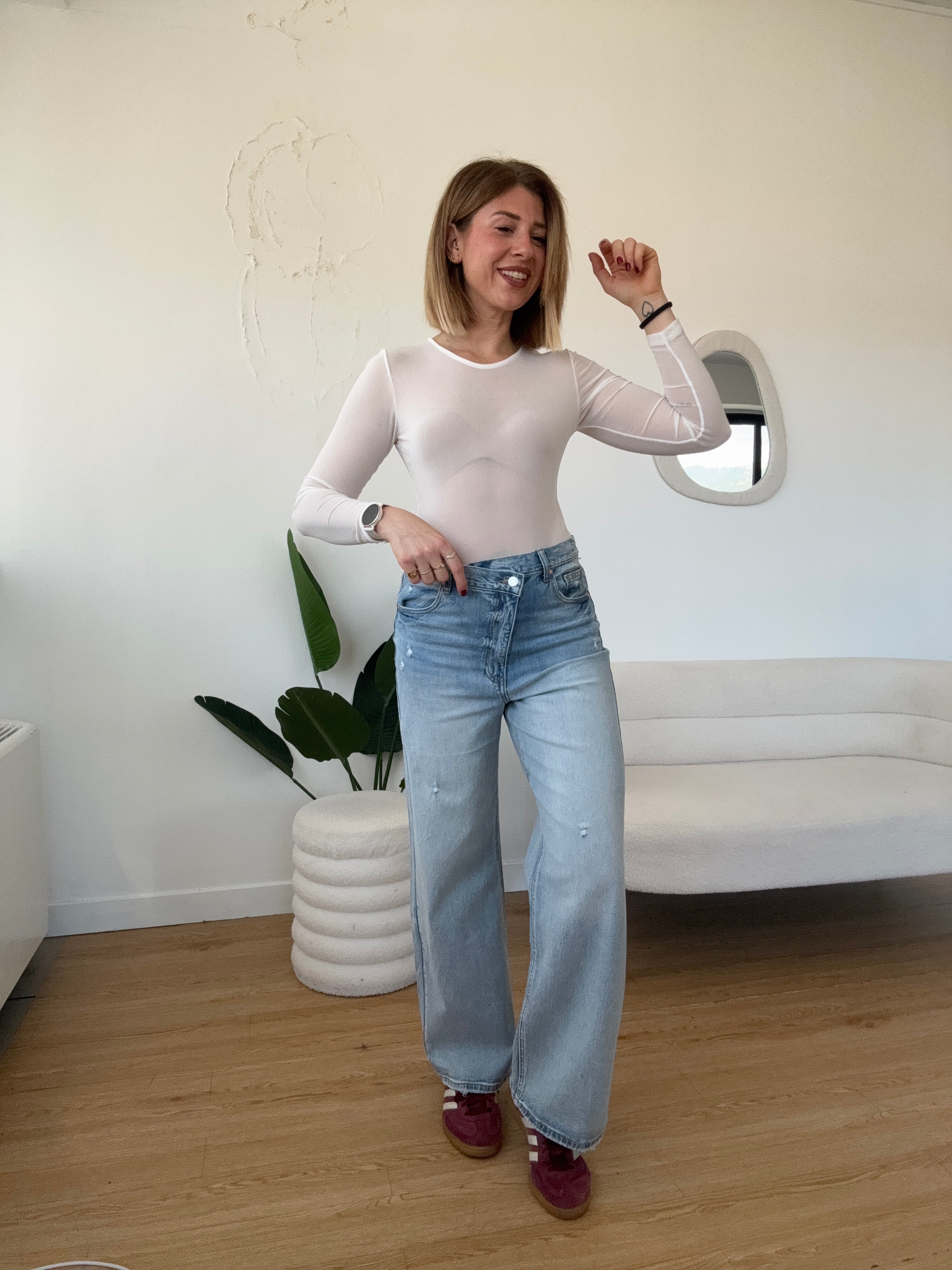 Jeans wide leg chiusura asimmetrica elasticizzato