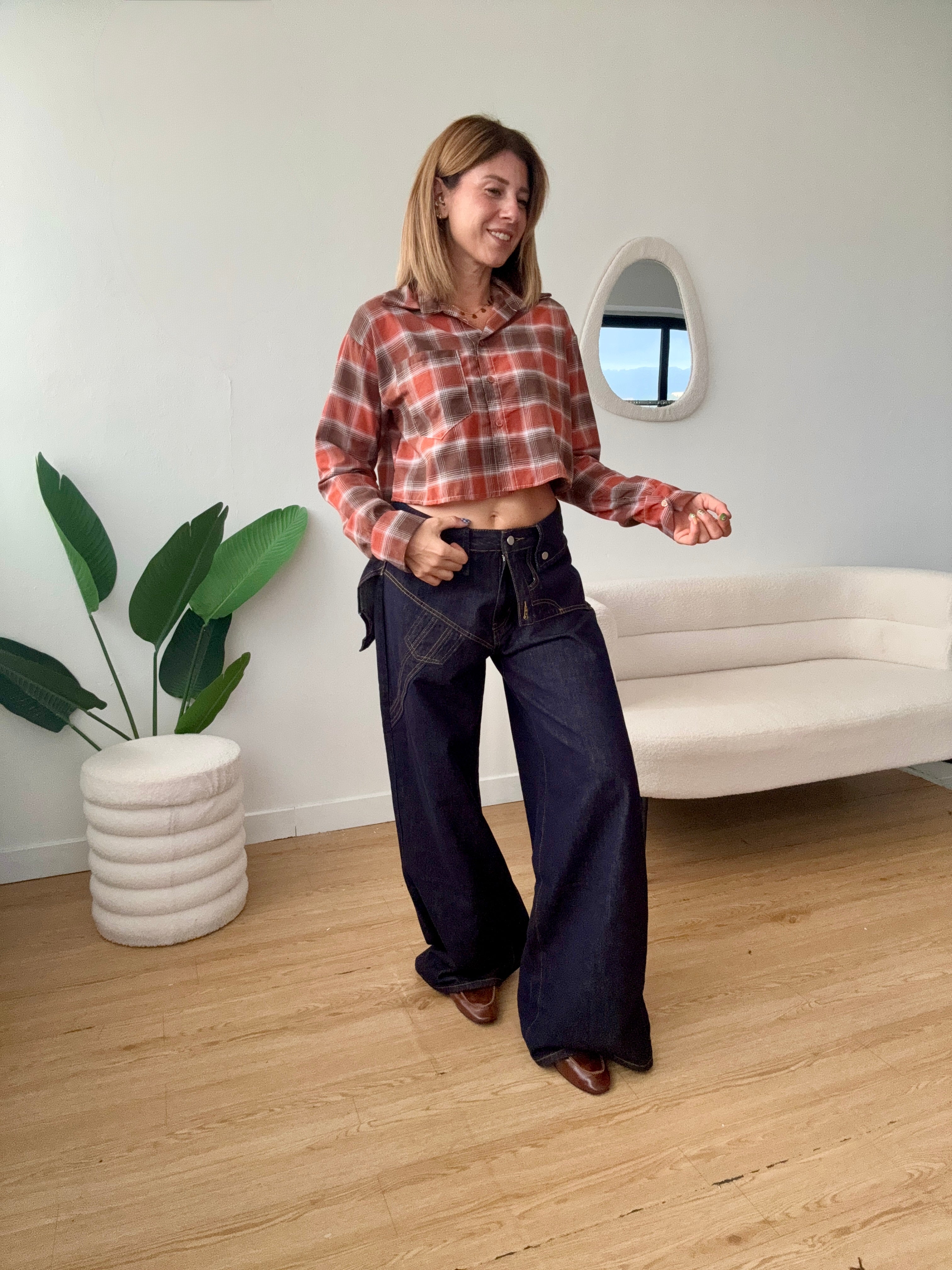 Jeans cintura effetto salopette