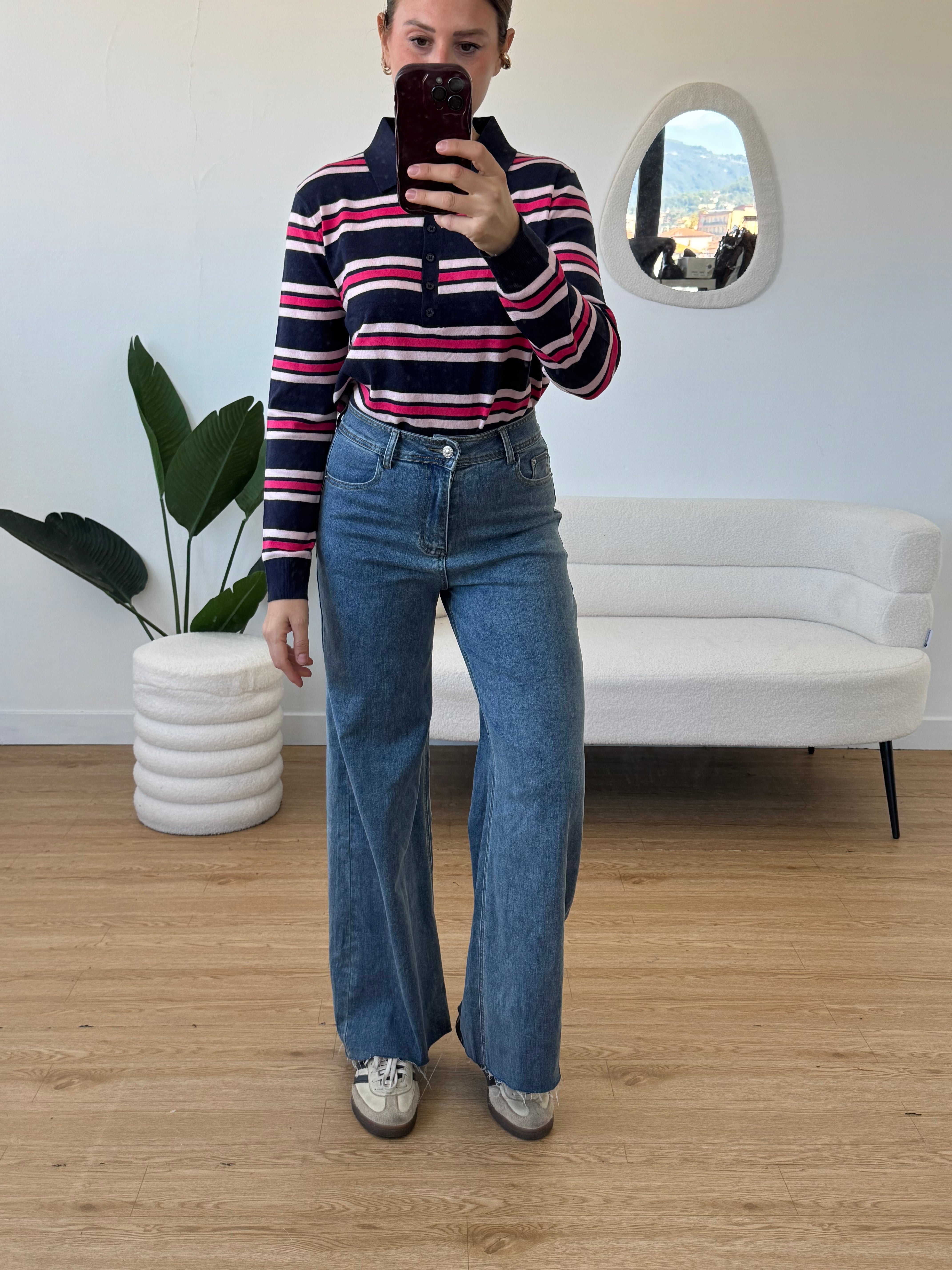 Jeans elasticizzato e sfrangiato vita alta