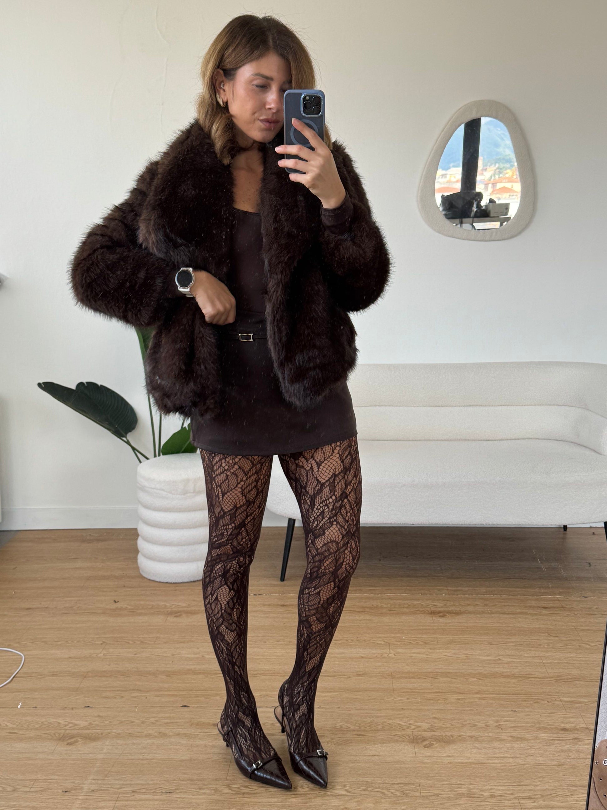 Pelliccia marrone con bottone