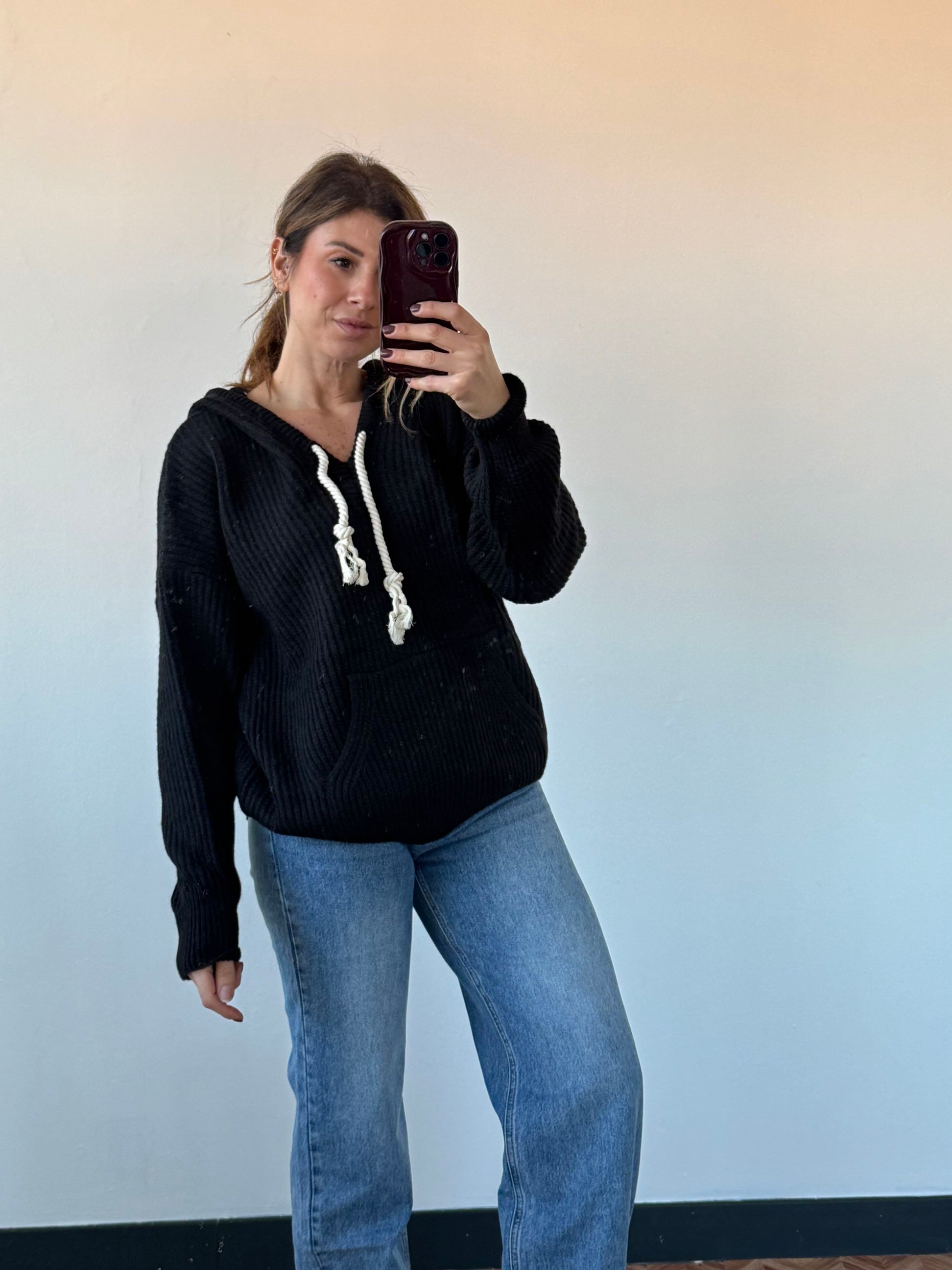 Maxi maglione con cappuccio e lacci