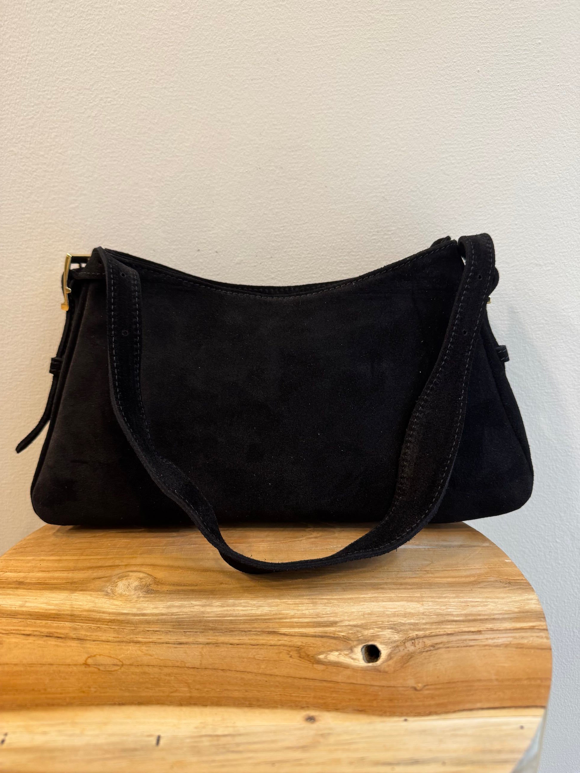 Borsa scamosciata con fibbie laterali tracolla regolabile