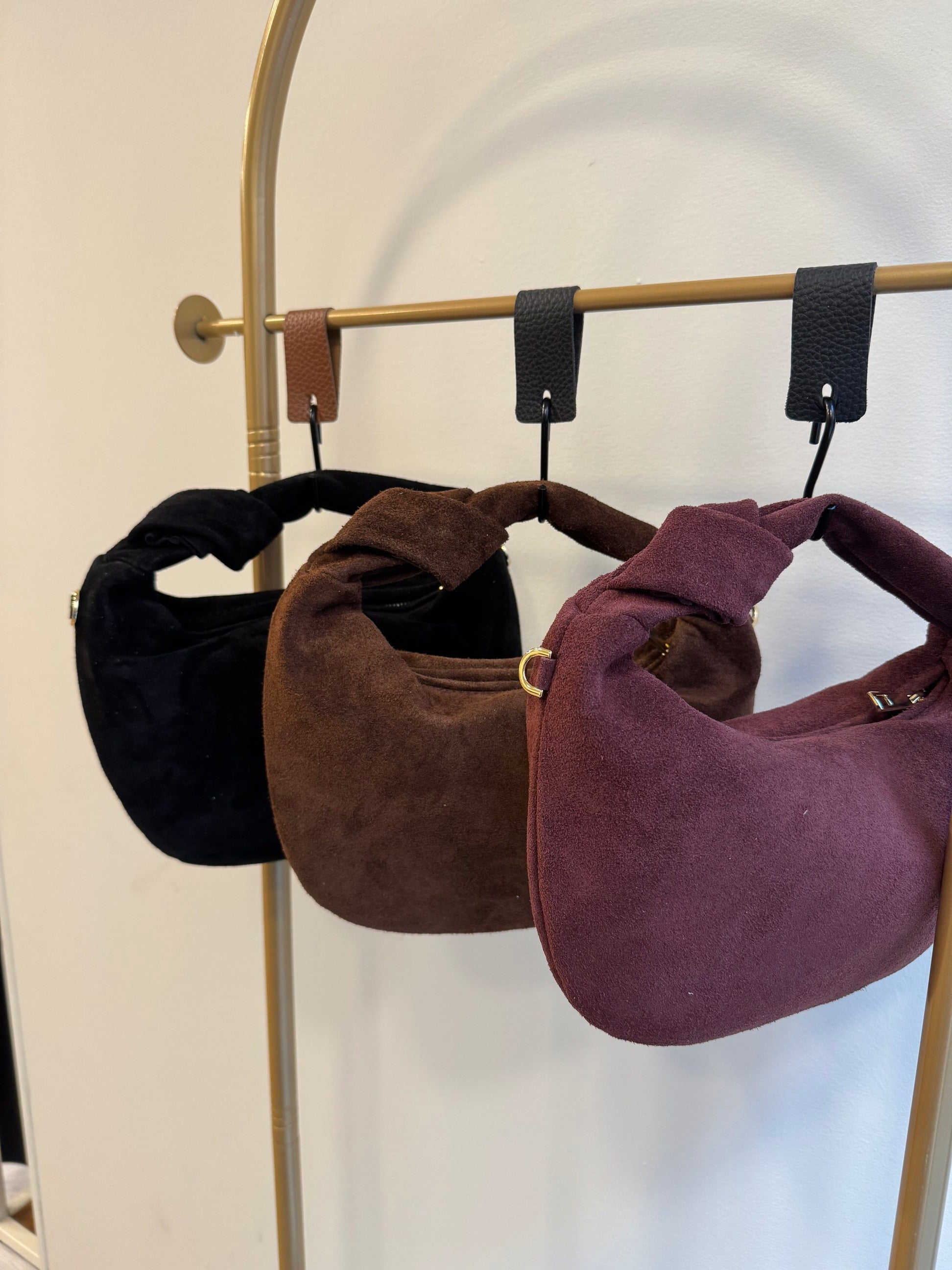 Borsa scamosciata mezza luna con nodo