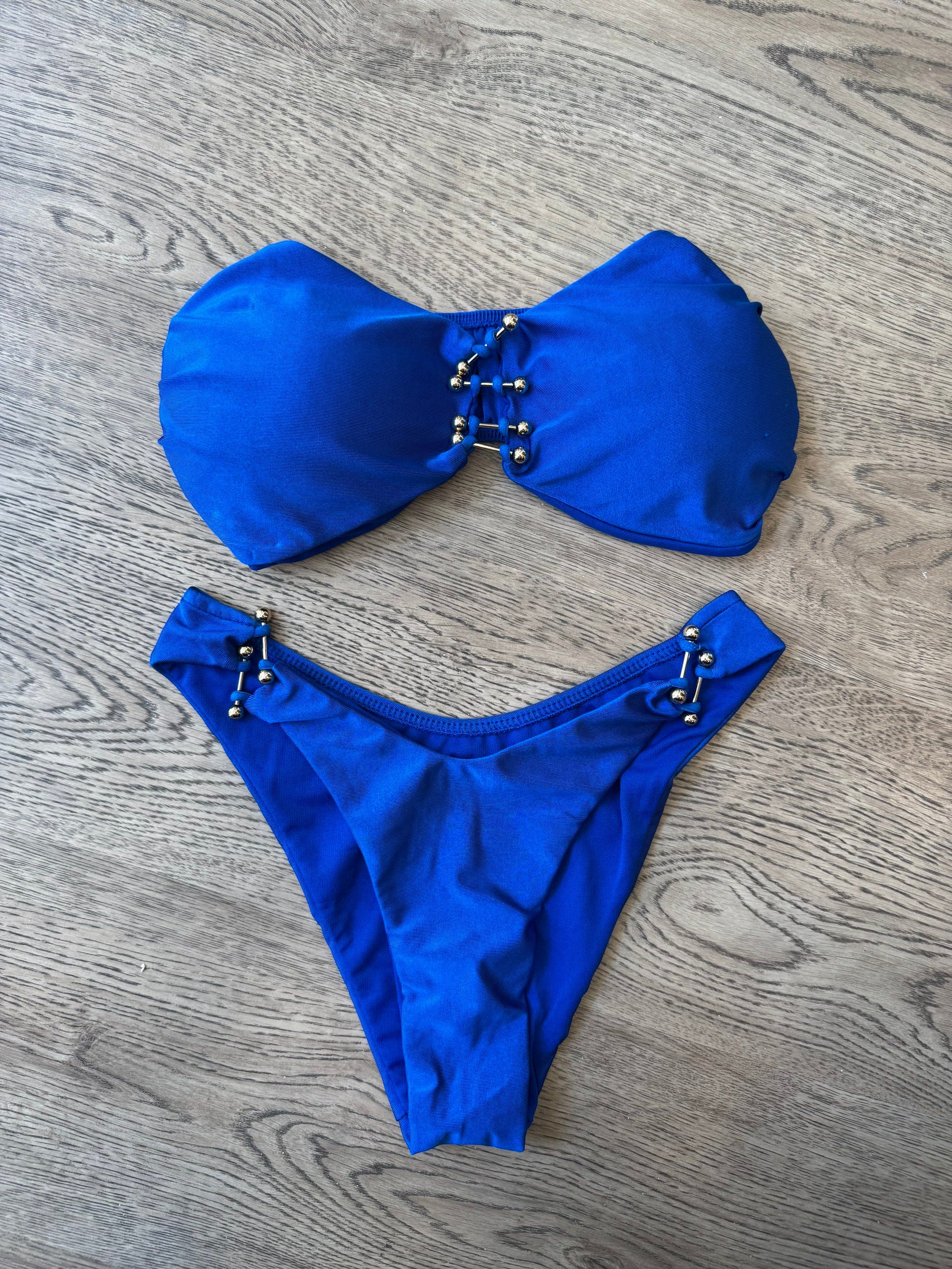 Bikini a fascia con applicazioni dorate