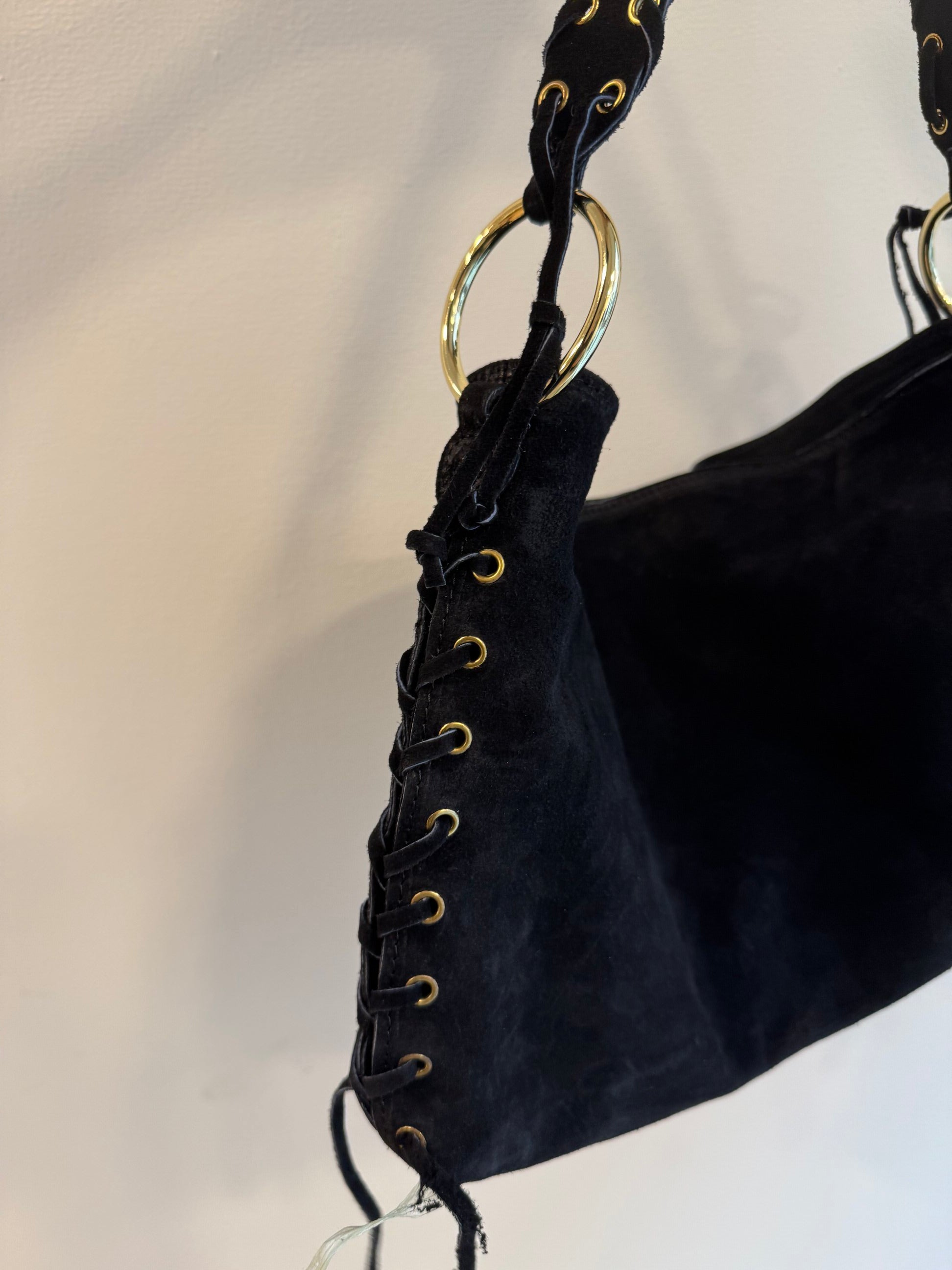 Borsa scamosciata con lacci intrecciati