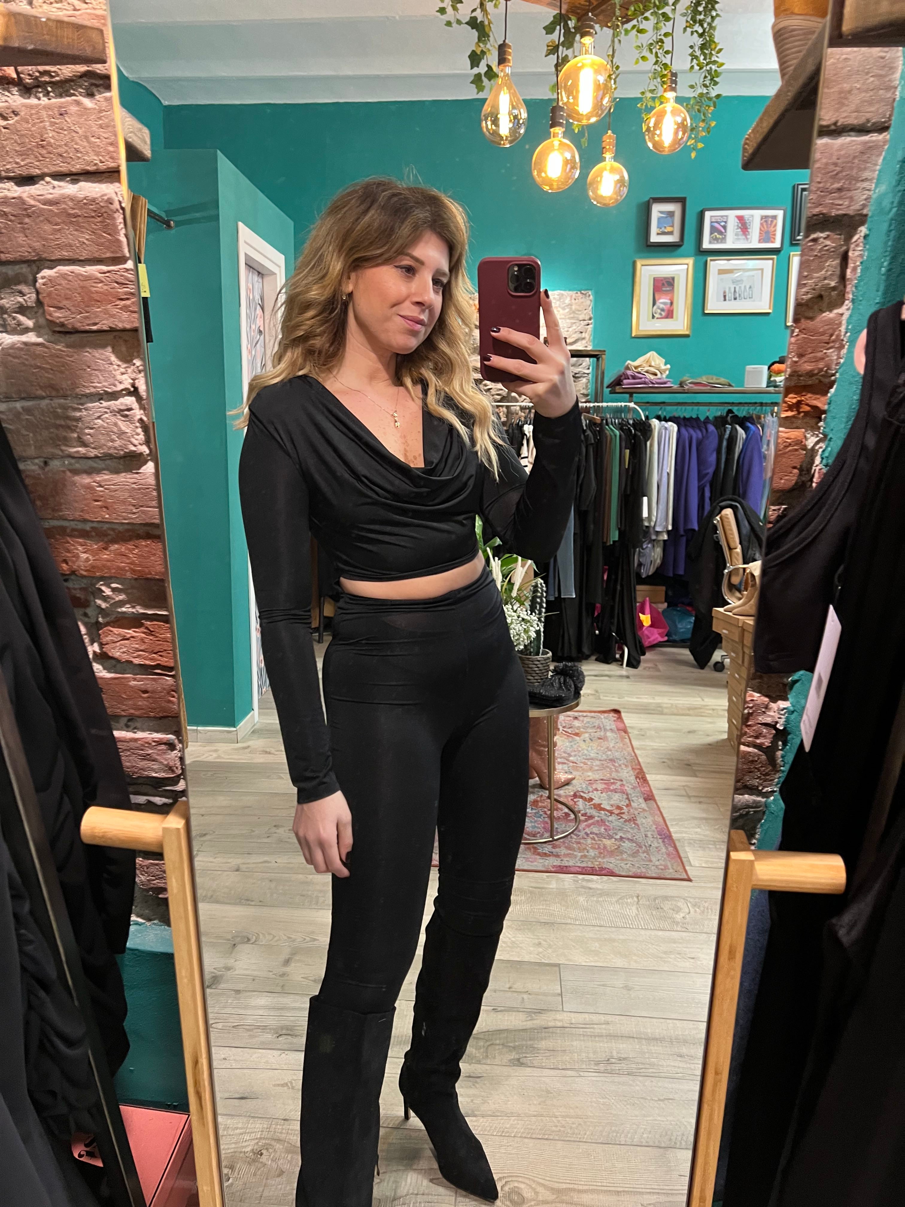 Tuta scollo drappeggio