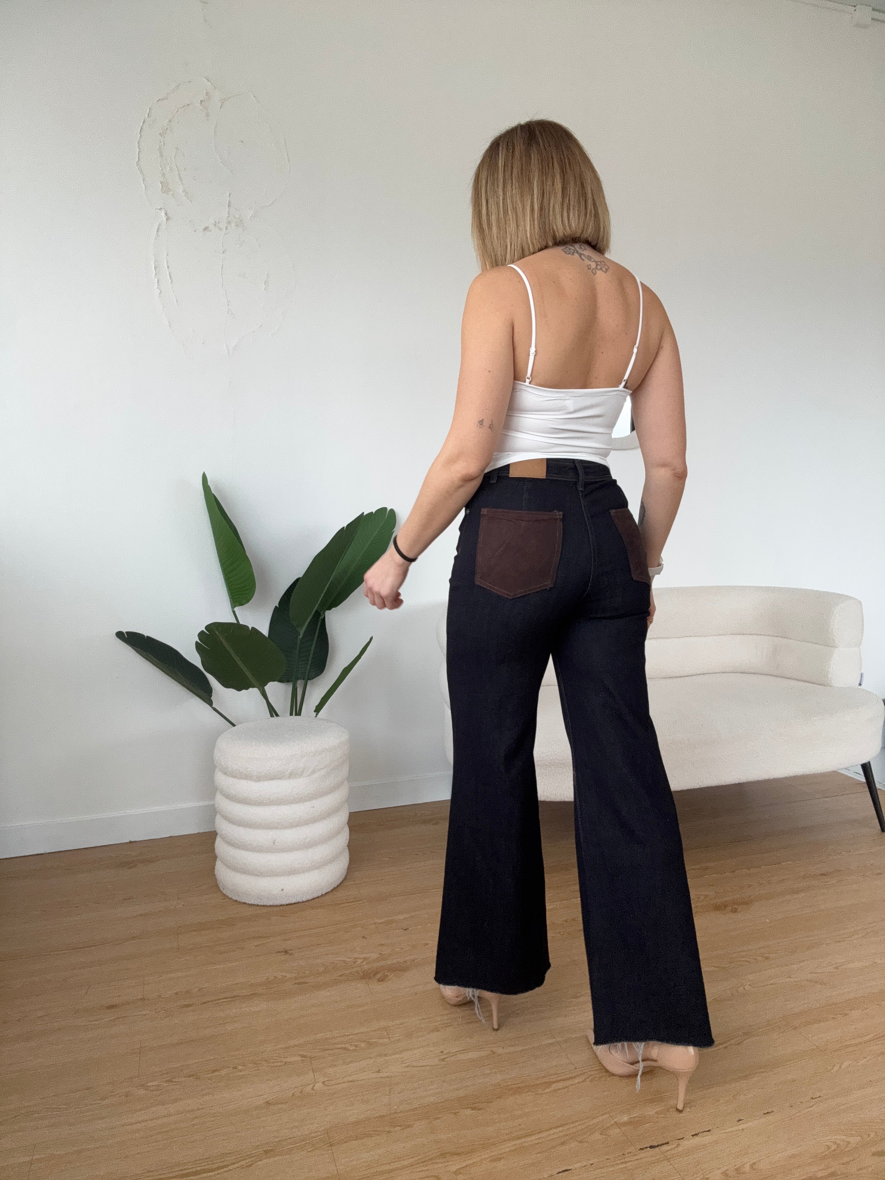 Jeans lavaggio scuro tasche marroni