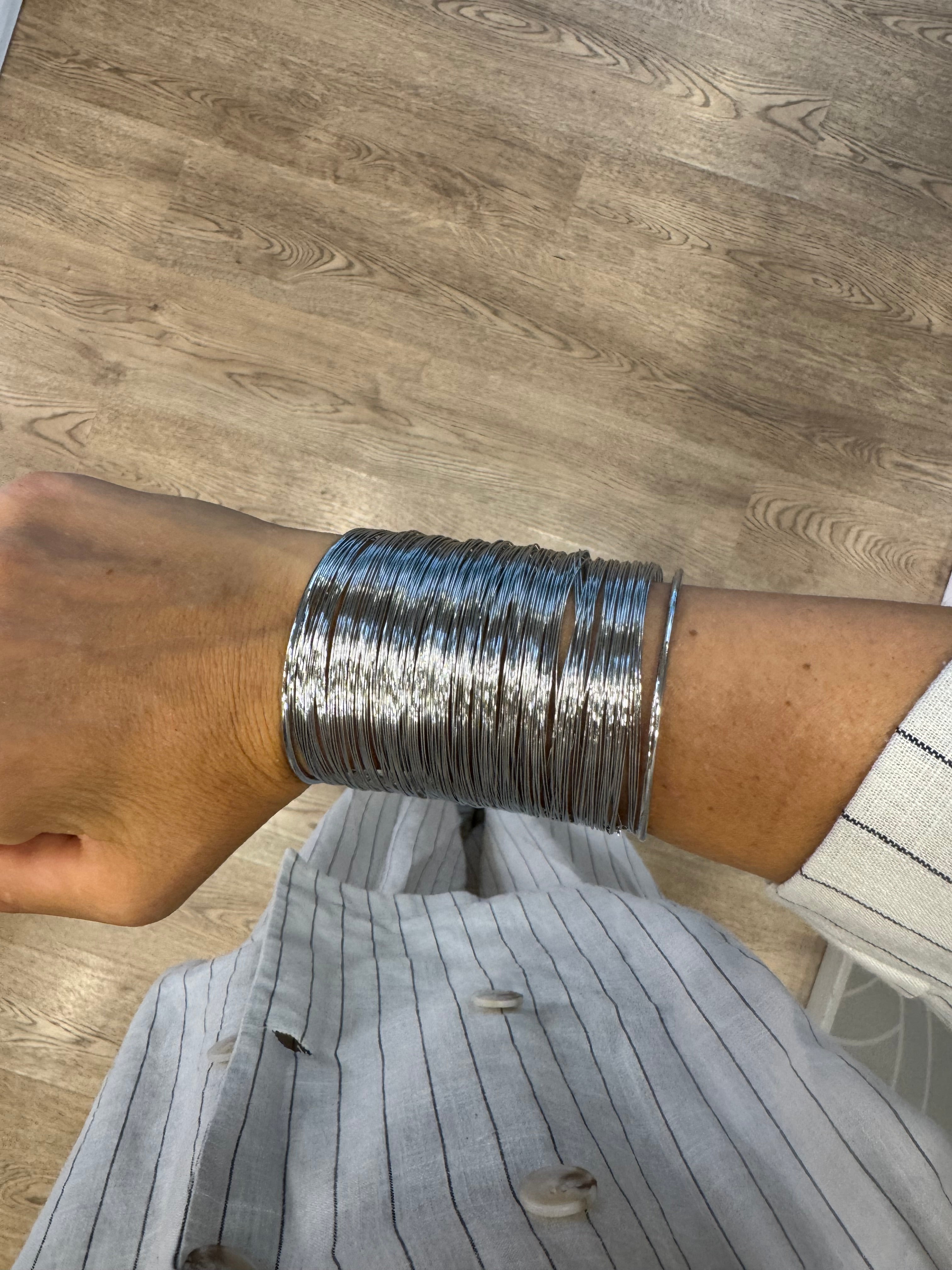 Bracciale polso rigido regolabile