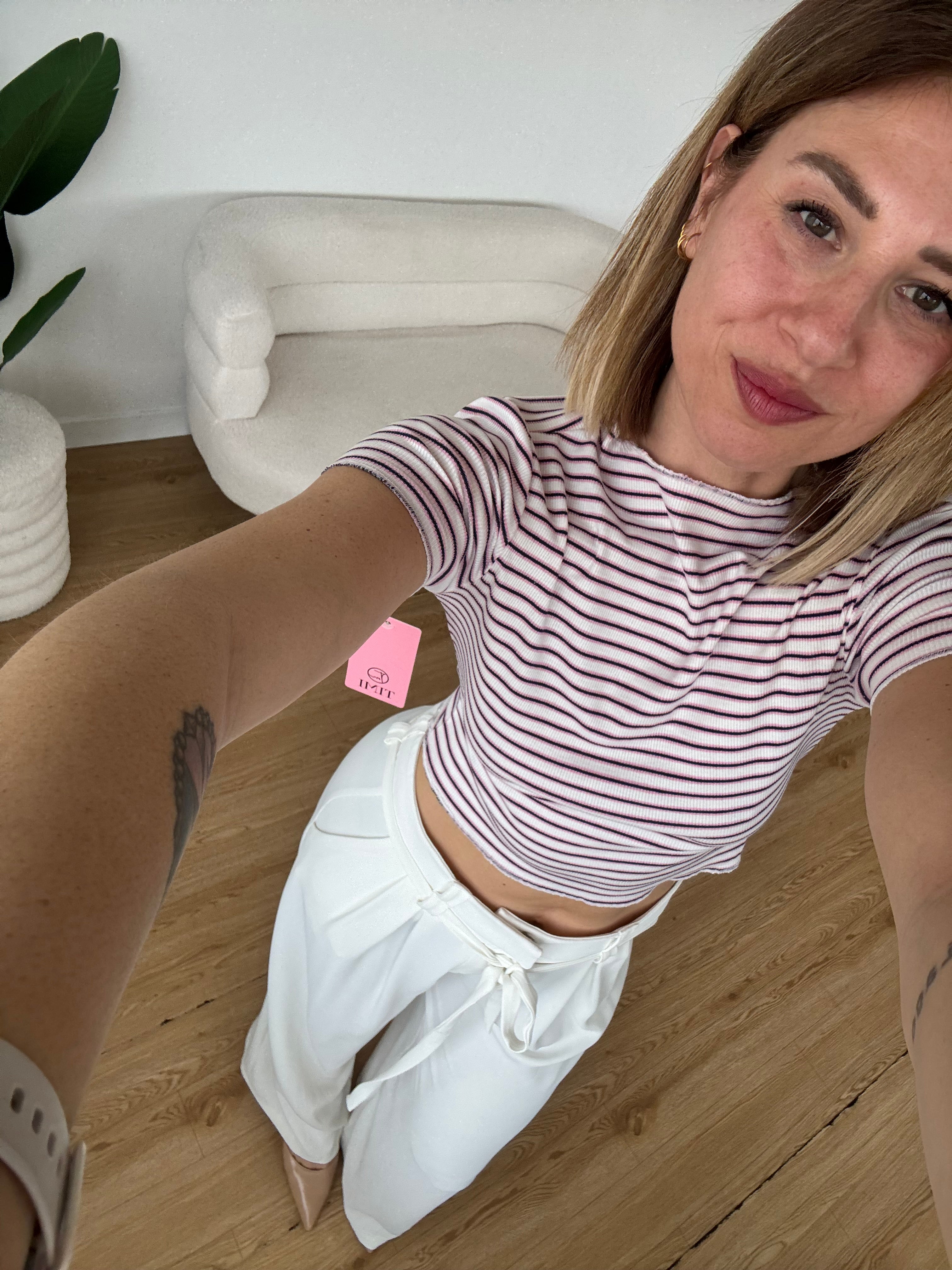 Crop top a righe mezze maniche