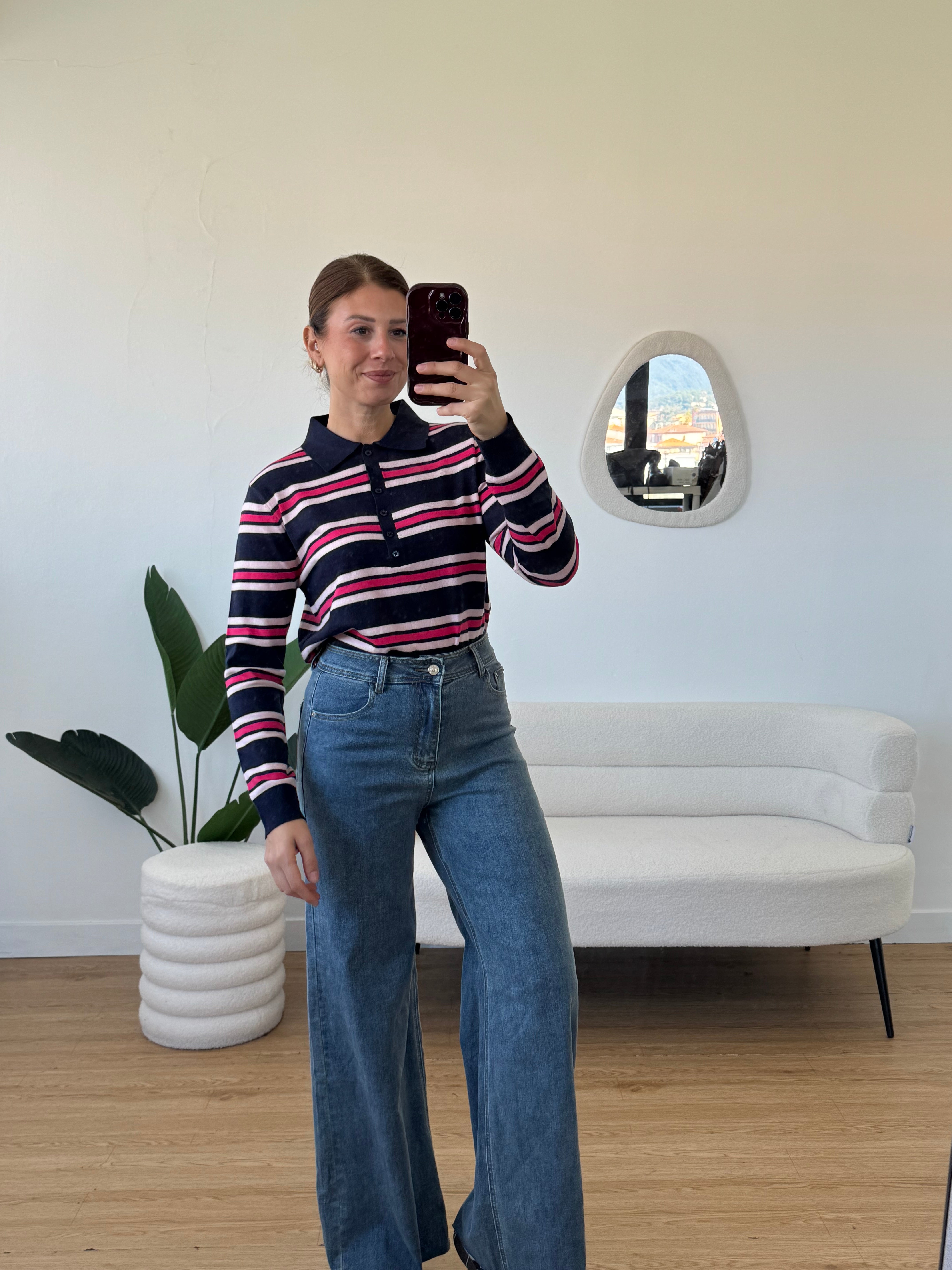 Jeans elasticizzato e sfrangiato vita alta