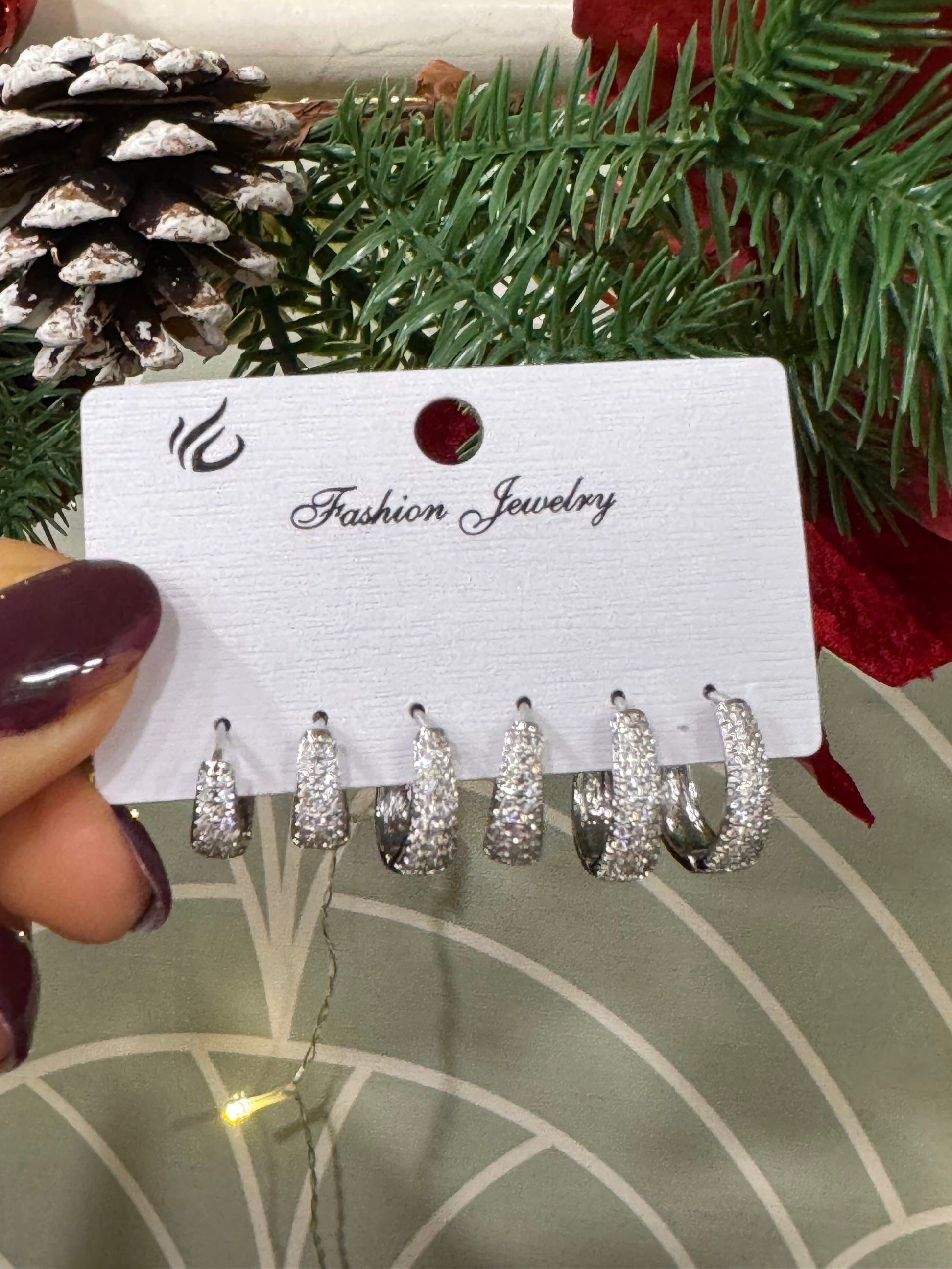 Set tre paia di orecchini con strass