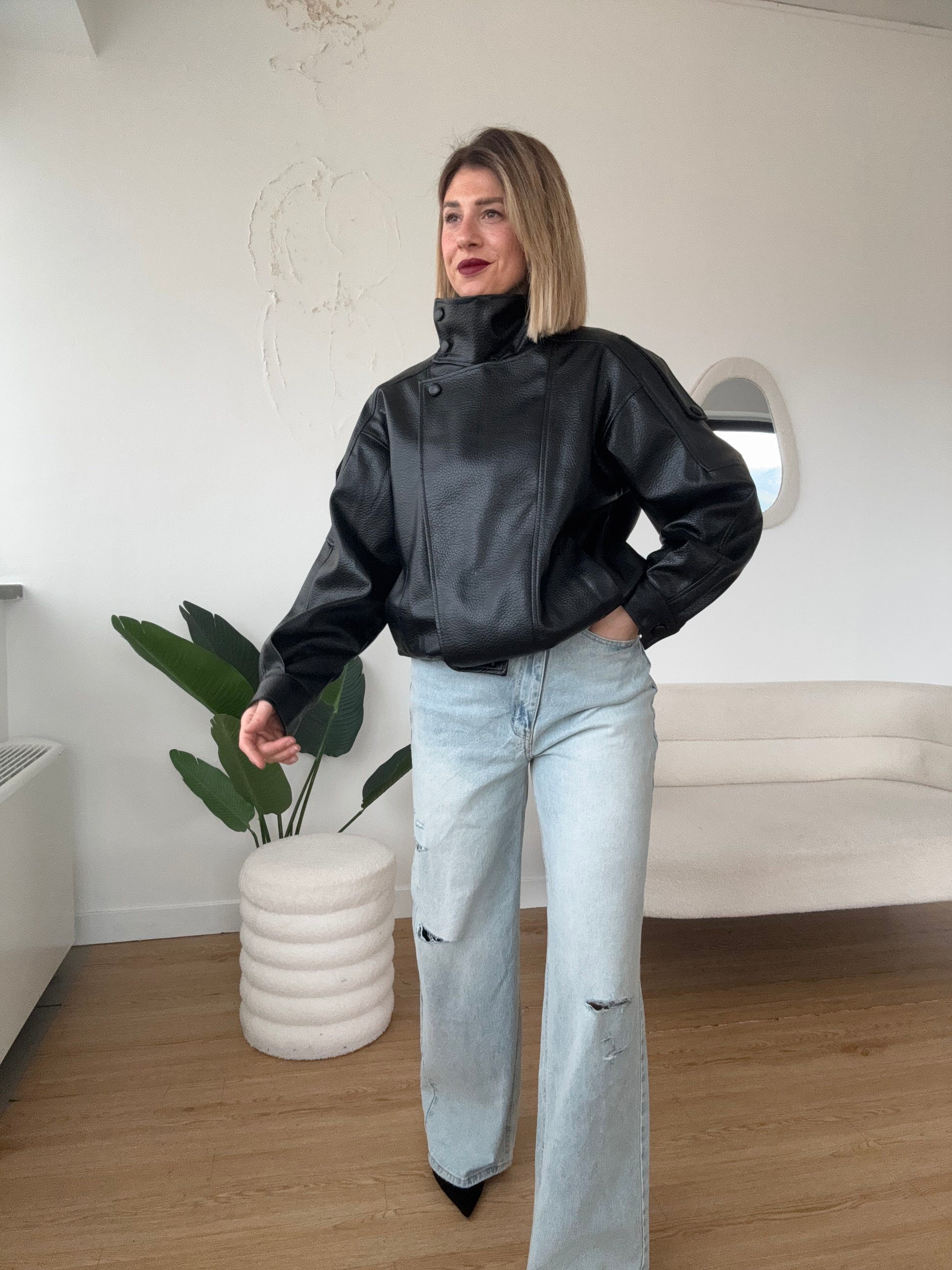 Chiodo ecopelle bottoni sul collo