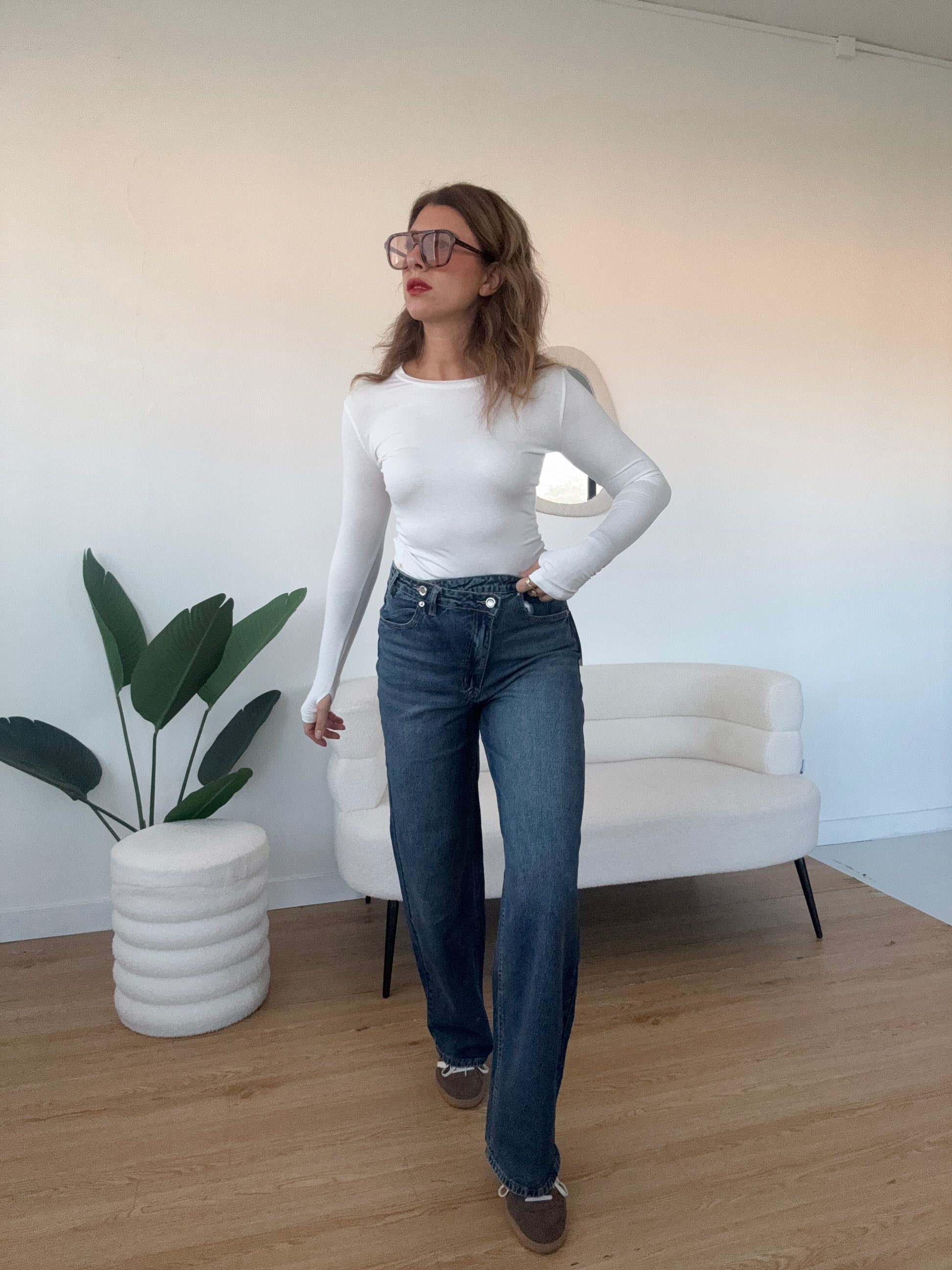 Jeans chiusura asimmetrica elasticizzato