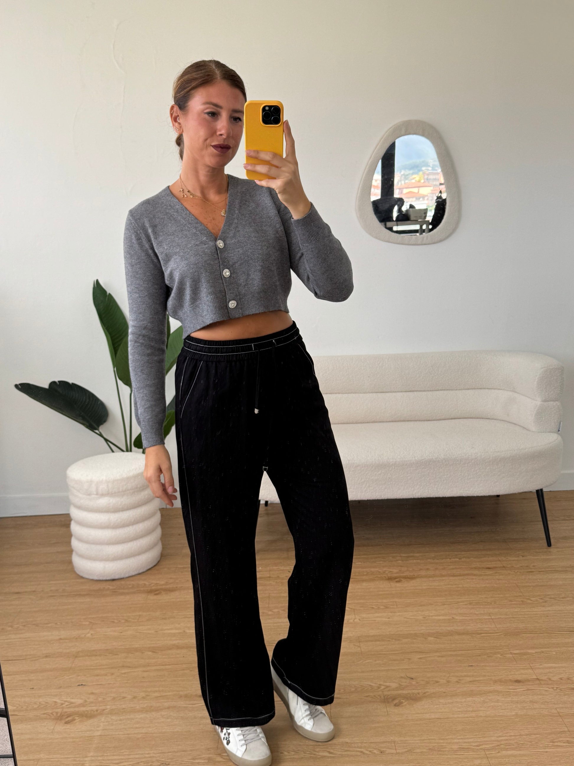 Pantaloni jogger a palazzo con bordini bianchi