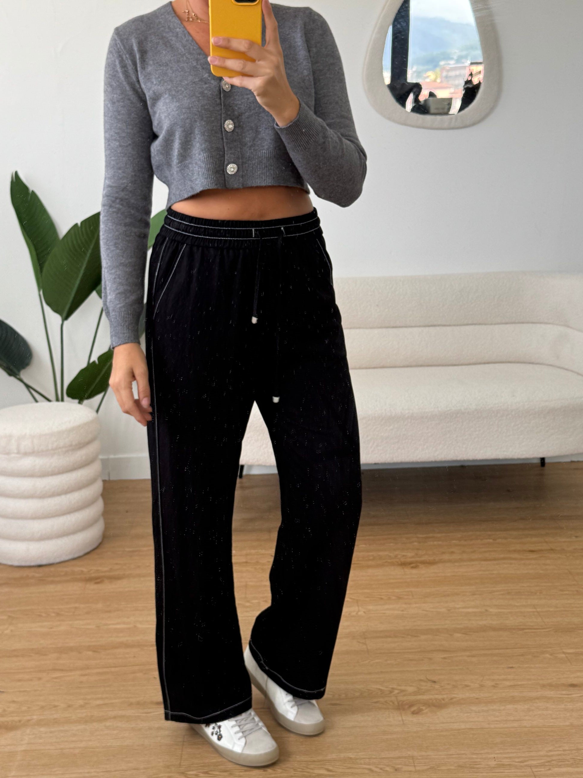 Pantaloni jogger a palazzo con bordini bianchi