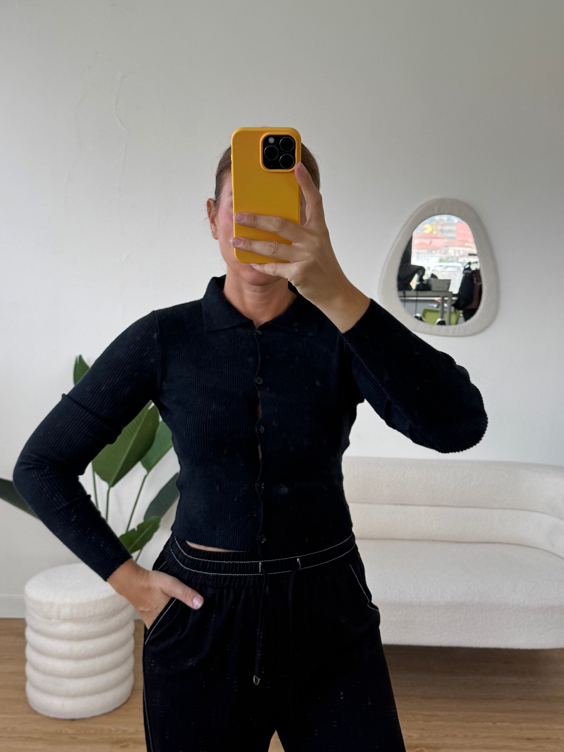 Polo in maglia a costine crop