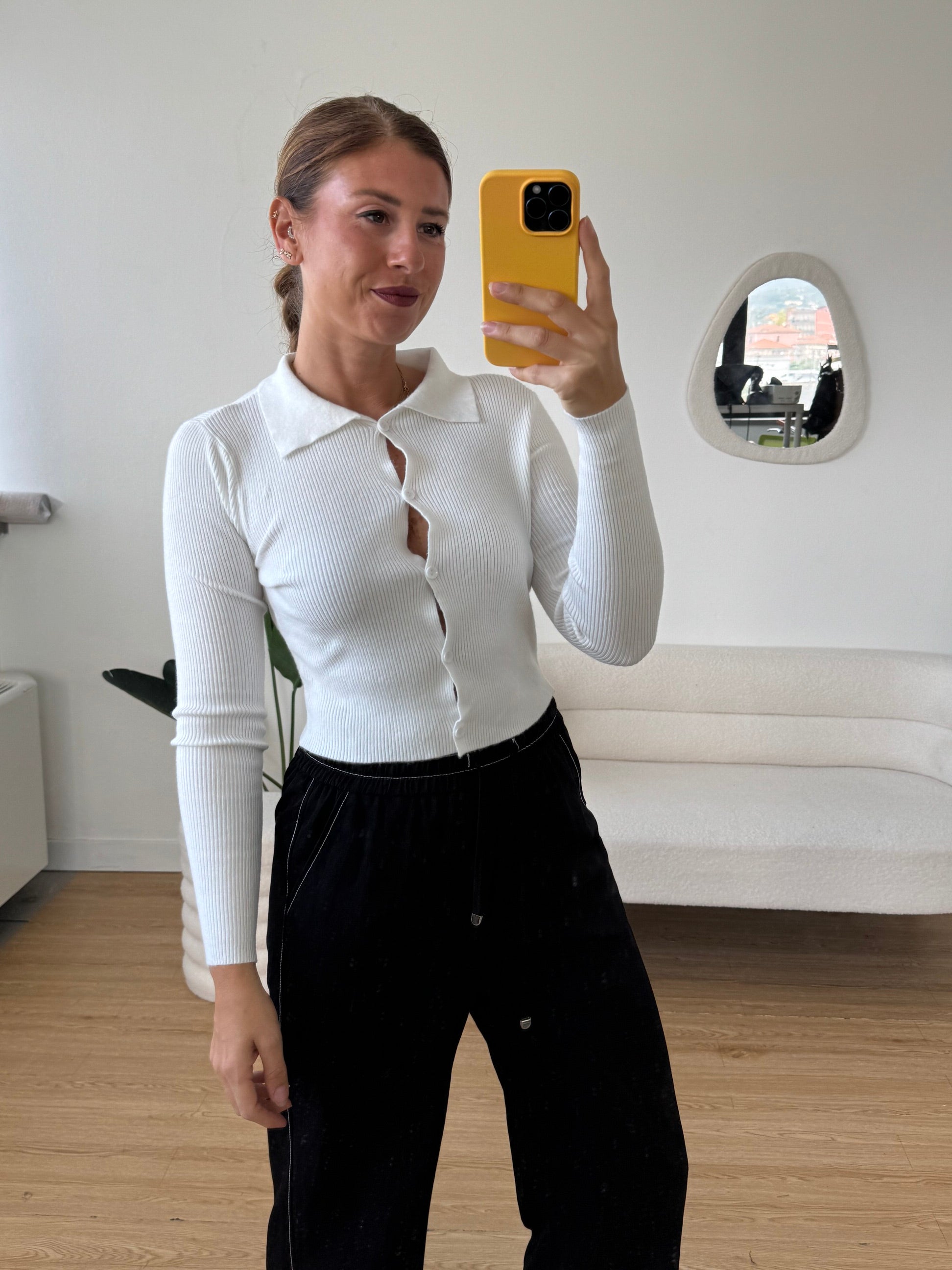 Polo in maglia a costine crop