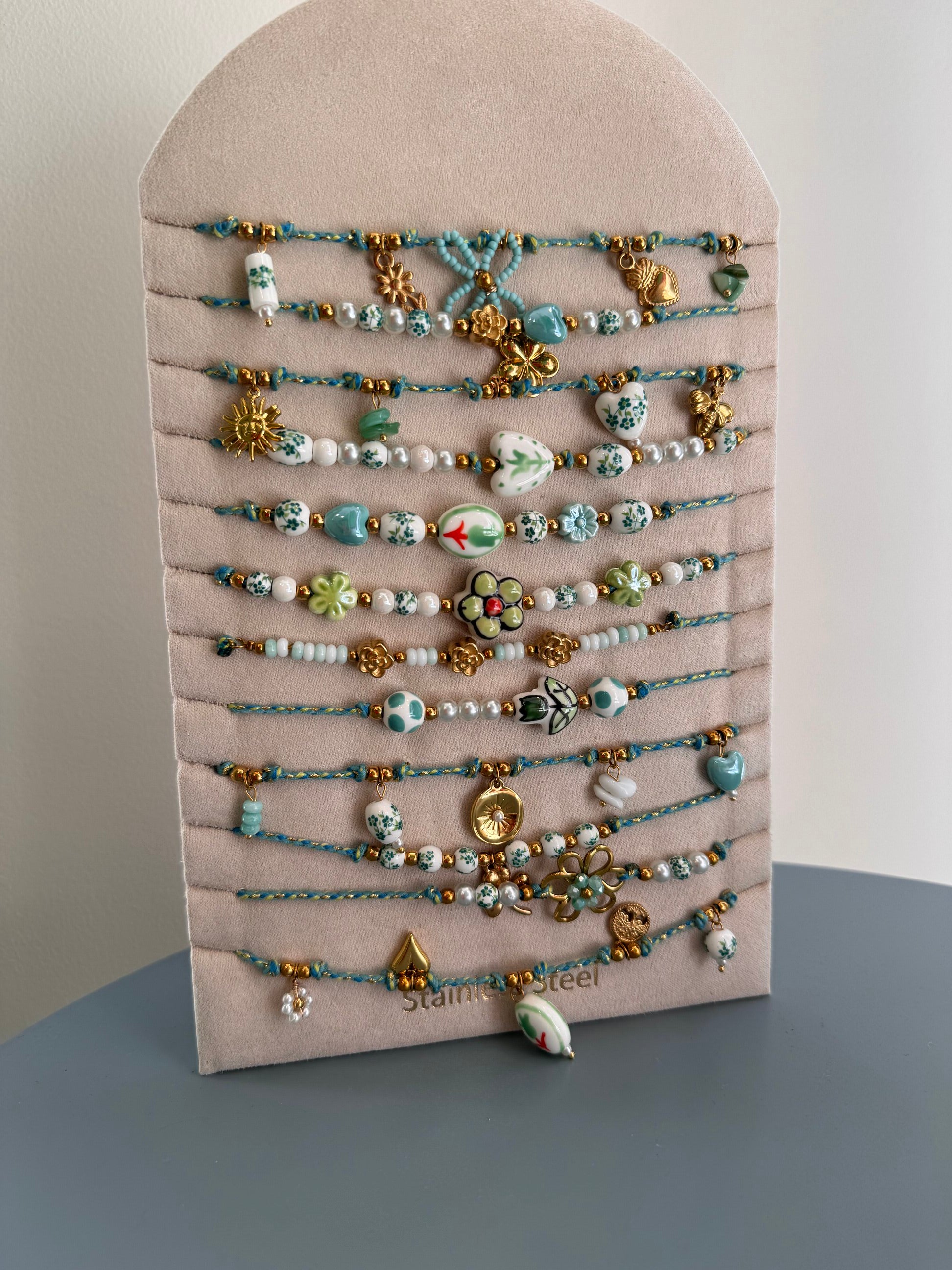 Collana portafortuna ciondoli disegnati verde