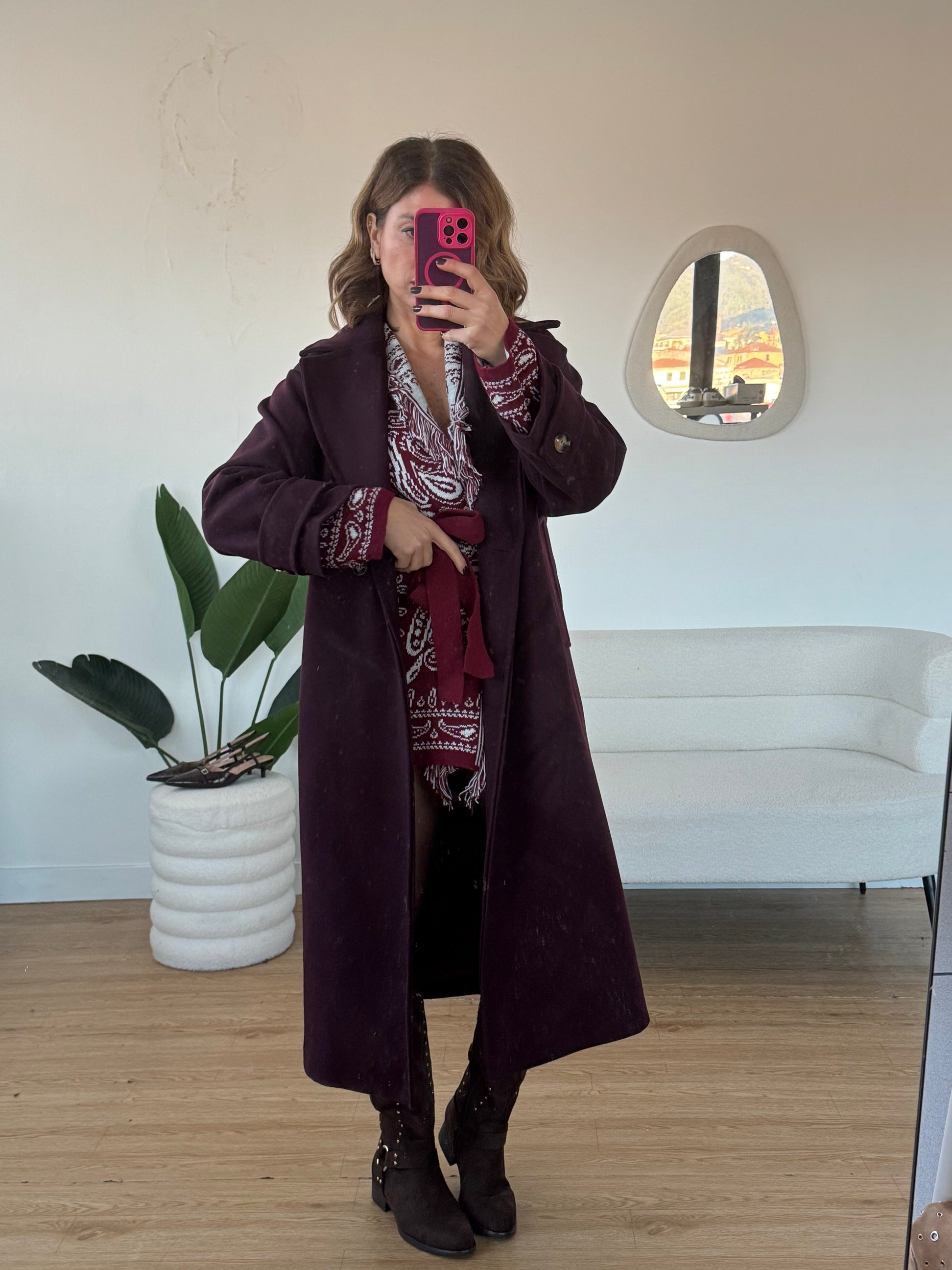 Cappotto lungo dettaglio bottone