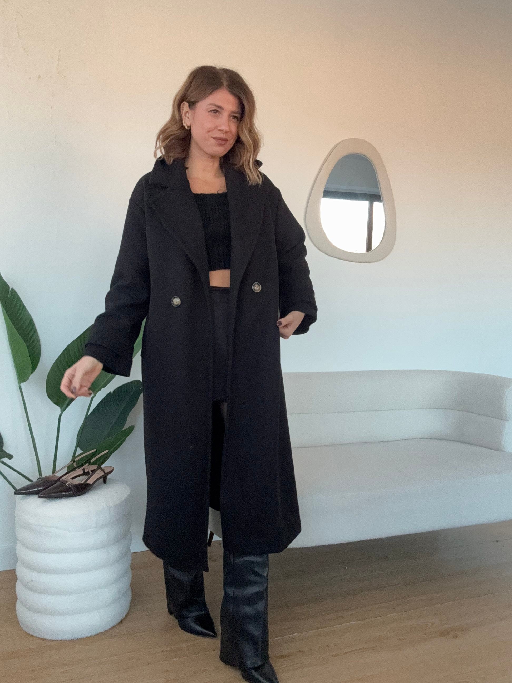 Cappotto lungo dettaglio bottone