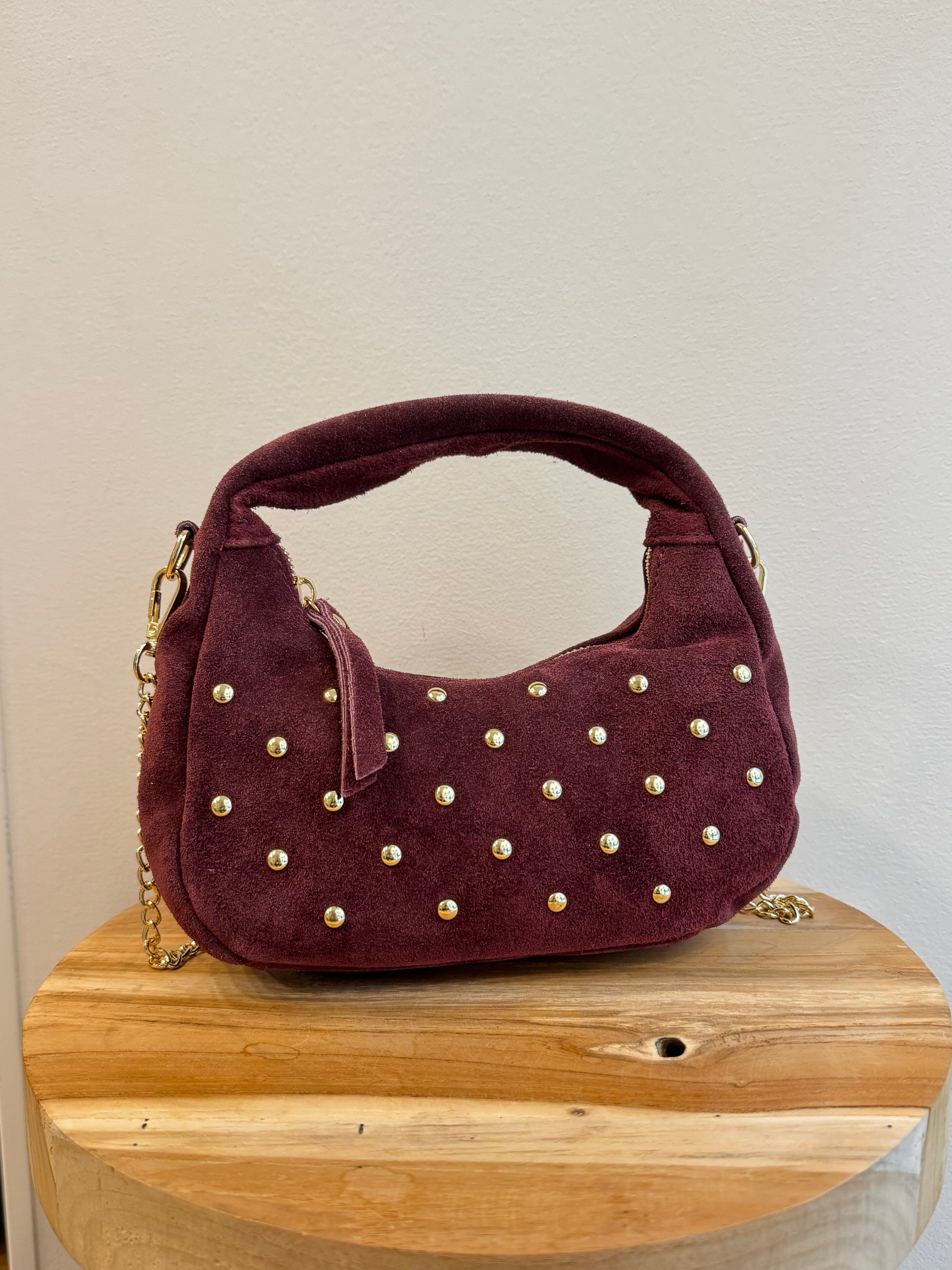 Borsa mezza luna con borche dorate