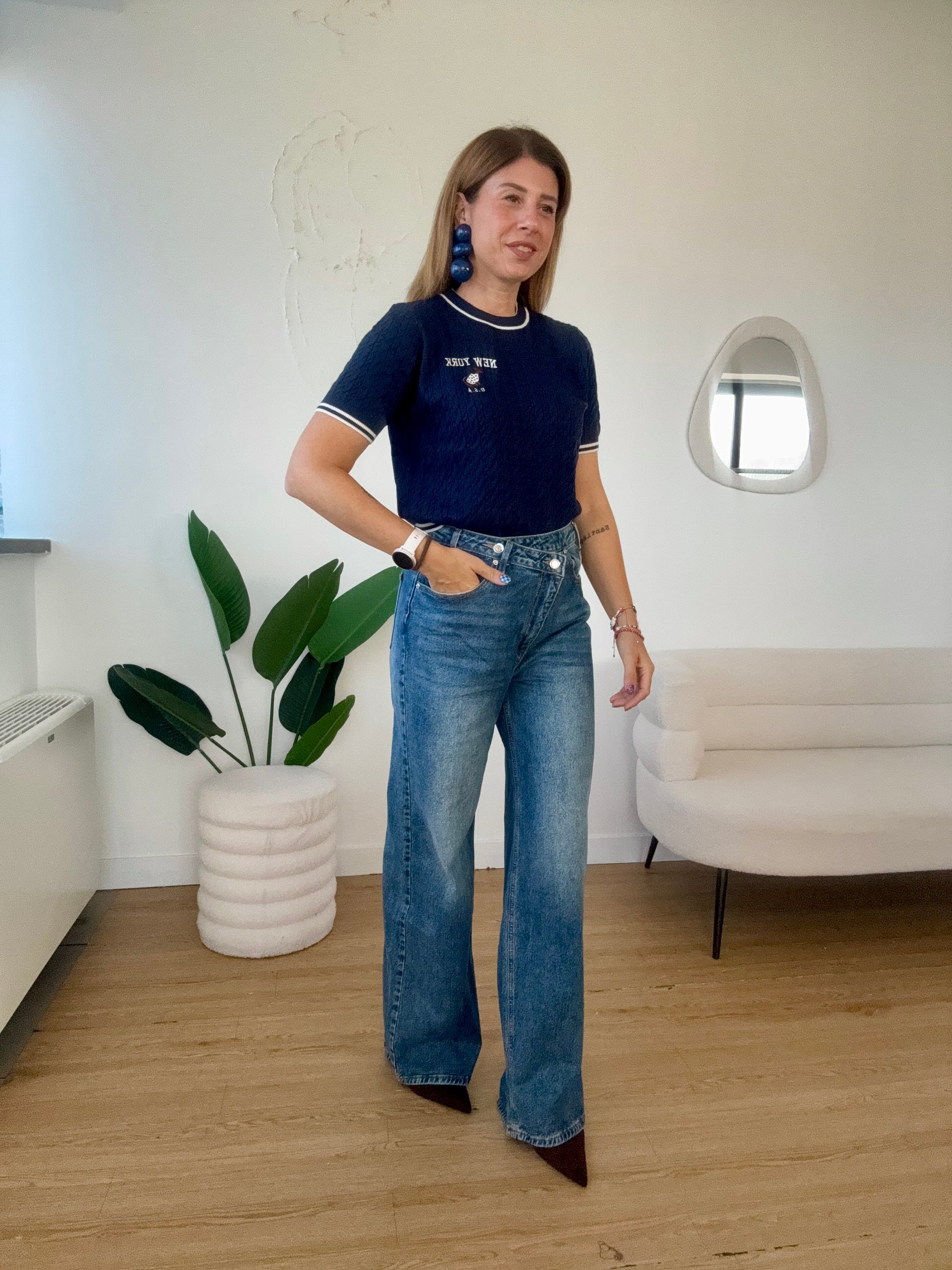 Jeans wide leg chiusura asimmetrica