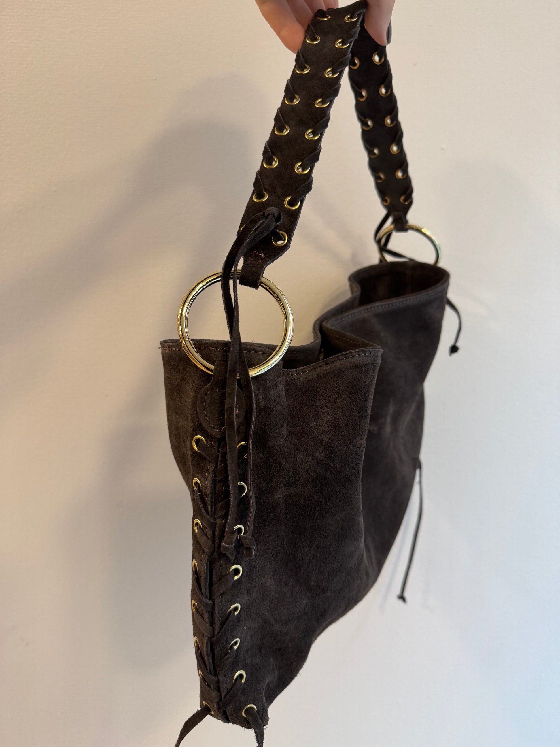 Borsa scamosciata con lacci intrecciati